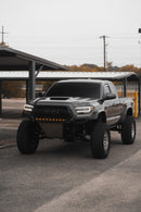 Three quarters view of a truck with a RFT lightbar installed on the grill