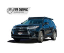 Blue Toyota Highlander with a Prinsu Roof rack mounted on the roof.