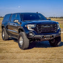 Front angle view of a blue GMC Sierra 1500 with an RTS “Rugged Terrain Series” Front Winch Bumper.