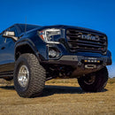 Low angle front view of a blue GMC Sierra 1500 with an RTS “Rugged Terrain Series” Front Winch Bumper.