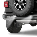 Rear end of a Jeep with ORACLE Lighting Rear Bumper LED Reverse Lights installed, and shining brightly.