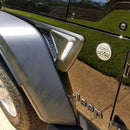 Close-up of Sidetrack™ LED Lighting System installed on a Jeep, with white LEDs on.