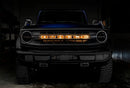 Front view of a Ford Bronco with Amber LED Illuminated Letter Badges installed.
