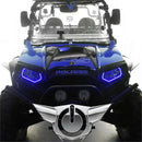 Front view of a Polaris RZR with blue headlight halos installed.