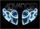 Toyota Supra headlights with white LED halo rings.