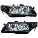 Acura TSX headlights with white LED halo rings.