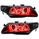 Acura TSX headlights with red LED halo rings.