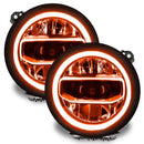 Jeep Wrangler JL headlights with amber DRLs.