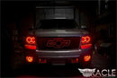 Front view of a Chevrolet Avalanche with red LED headlight and fog light halo rings installed.