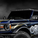 Close-up of Integrated Windshield Roof LED Light Bar System installed on the ORACLE Lighting Ford Bronco.