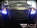 Front end of a GMC Terrain with white LED headlight halo rings installed.