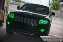Front end of a Jeep Grand Cherokee with green LED headlight and fog light halos.