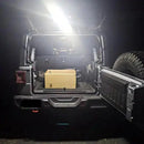 Rear view of a Jeep Wrangler with Cargo LED Light Module installed and turned on.