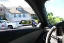 Point of view from the driver side with side mirror in view