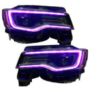 Jeep Grand Cherokee headlights with pink DRLs.