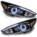 Ford Focus headlights with white halo rings.