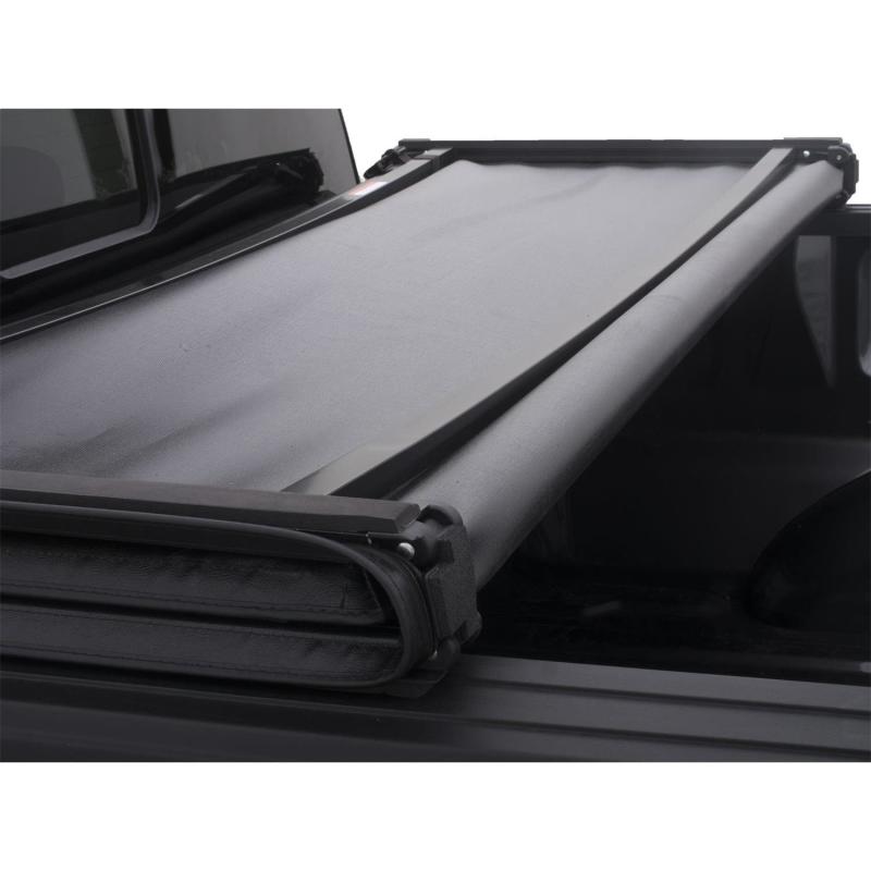 Lund 04-14 Ford F-150 (6.5ft. Bed) Genesis Tri-Fold Tonneau Cover - Black