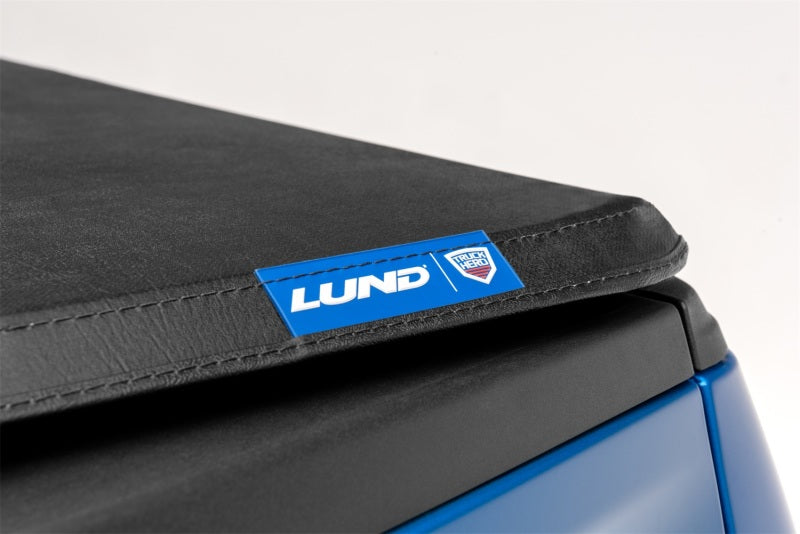 Lund 04-14 Ford F-150 (6.5ft. Bed) Genesis Tri-Fold Tonneau Cover - Black