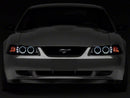Raxiom 99-04 Ford Mustang Dual LED Halo Projector Headlights- Black Housing (Smoked Lens)